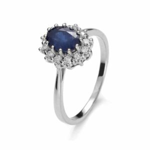 Pierścionek z białego złota z brylantami i szafirem 0.24 ct